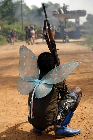 Moving Shot of a Child Fairy Soldier Looking on in CAR